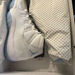 Jordan retros 11s , brand new in the box. Blue and white .